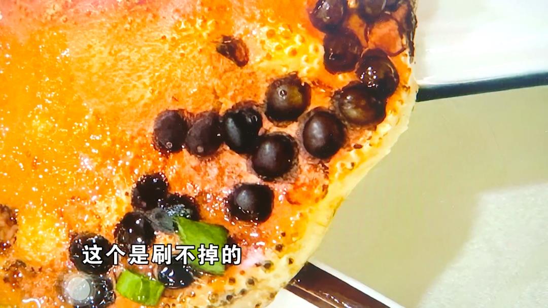 DƬ